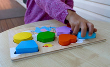 Wooden puzzle Elephant holding balloons of different colours and shapes