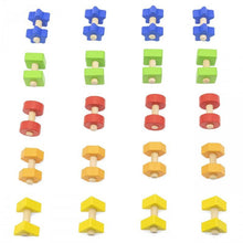 Set of colorful wooden building blocks with star-shaped tops on a white background open ended wooden toys preschool