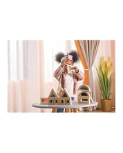 large, mirrored building shape blocks