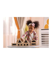 large, mirrored building shape blocks