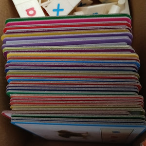 Stack of colorful index cards with various words CVC 