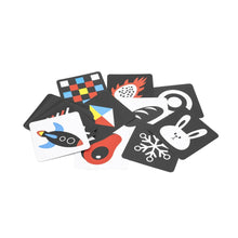 Set of black cards with colorful designs on a white background baby toys
