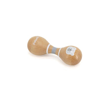 Wooden baby toy with a white label on a white background