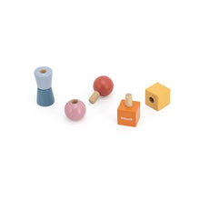 Set of colorful wooden toys on a white background fine motor wooden toys