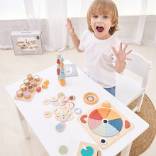 3 year old playing with montessori based toys 