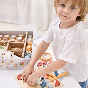 3 year old playing with wooden toys educational toys
