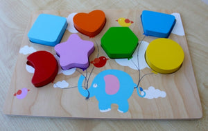 Wooden puzzle Elephant holding balloons of different colours and shapes