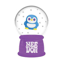 Snow globe with a penguin design on a purple base, featuring the brand 'Nee Doh'.