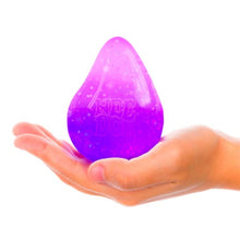 Purple egg-shaped object held in a hand on a white background