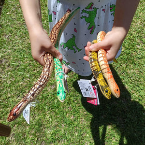 4 coloured toy wood snakes