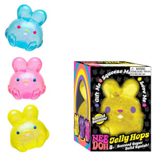 Three colorful jelly hop toys with a packaging box in the center.
