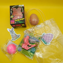 Collection of vintage toys and packaging on a yellow background