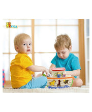 Children playing with wooden shape sorter 
