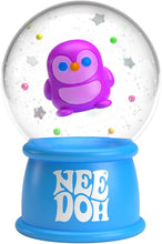 Purple penguin inside a snow globe with a blue base featuring 'Nee Doh' branding.