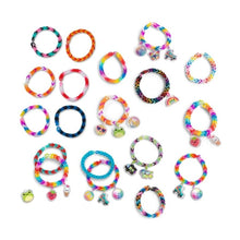 Collection of colorful bracelets with charms on a white background