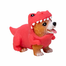 Toy figure of a dog in a red dinosaur costume on a white background