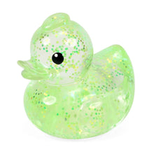 Green glittery rubber duck on a white background