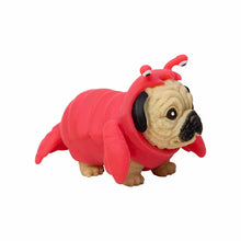 Toy figure of a dog in a red lobster costume on a white background