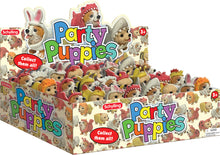 Box of Schylling Party Puppies toys with colorful packaging.