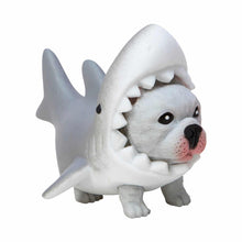 Toy figure of a bulldog with a shark shell on a white background