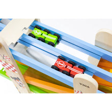 Colorful toy train set with tracks and cars on a white background