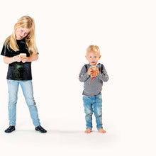 Children playing playroom wooden phones